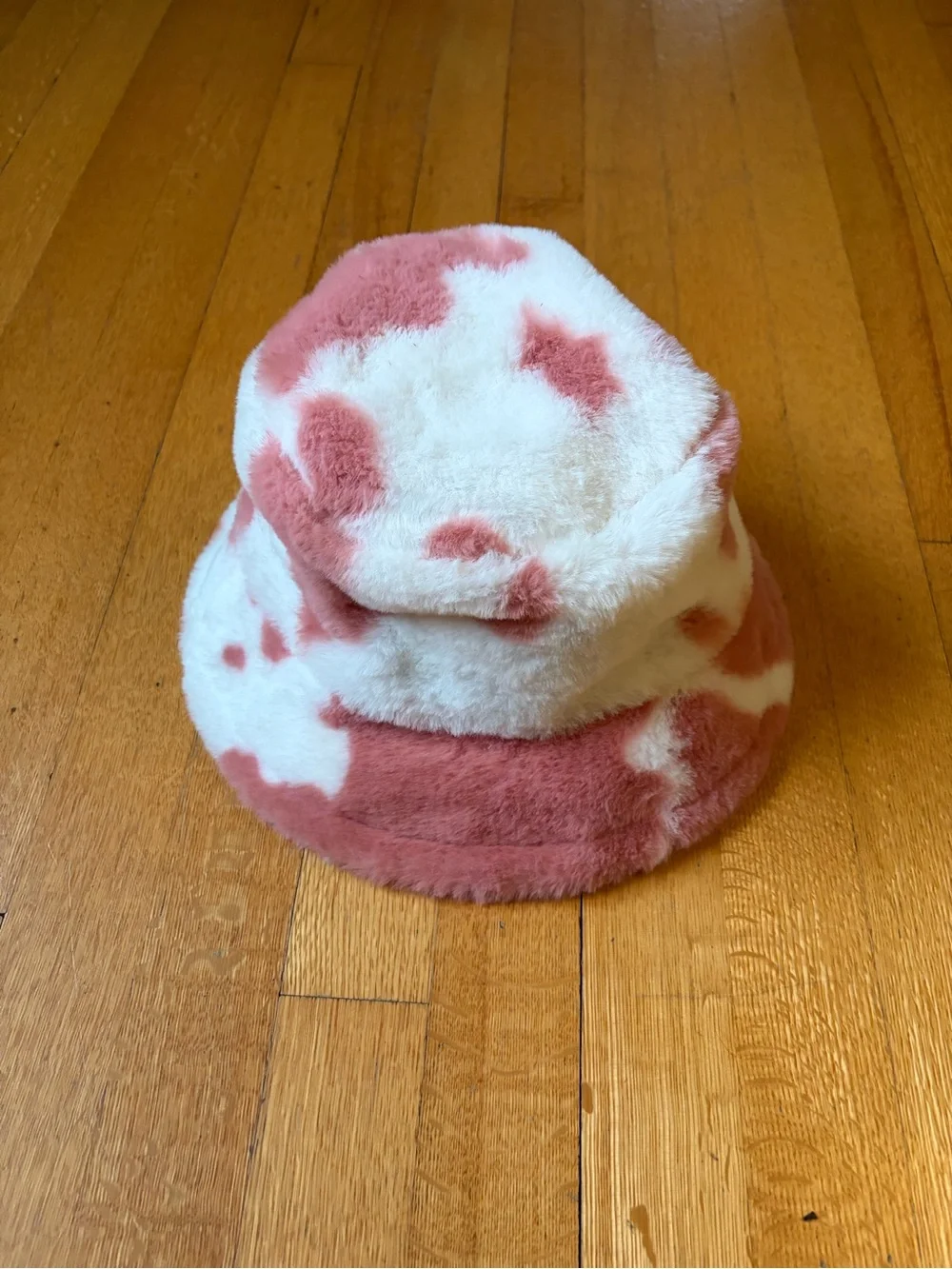 Pink cow print fluffy bucket hat